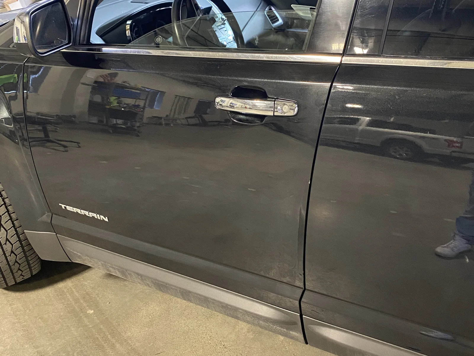 GMC door after paintless dent repair by SFR