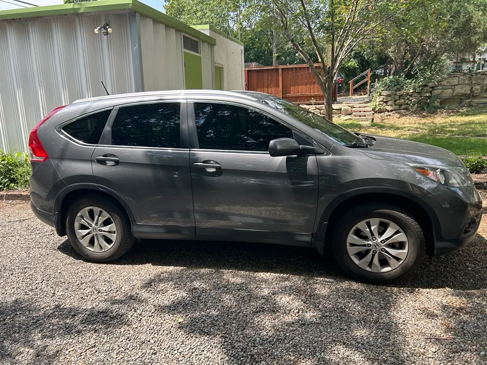 Champagne Honda CR-V side profile with window tint by SFR Tint & PDR
