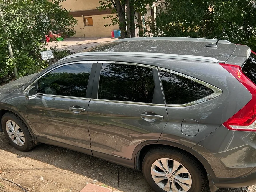 Champagne Honda CR-V tinted side windows close-up by SFR Tint & PDR