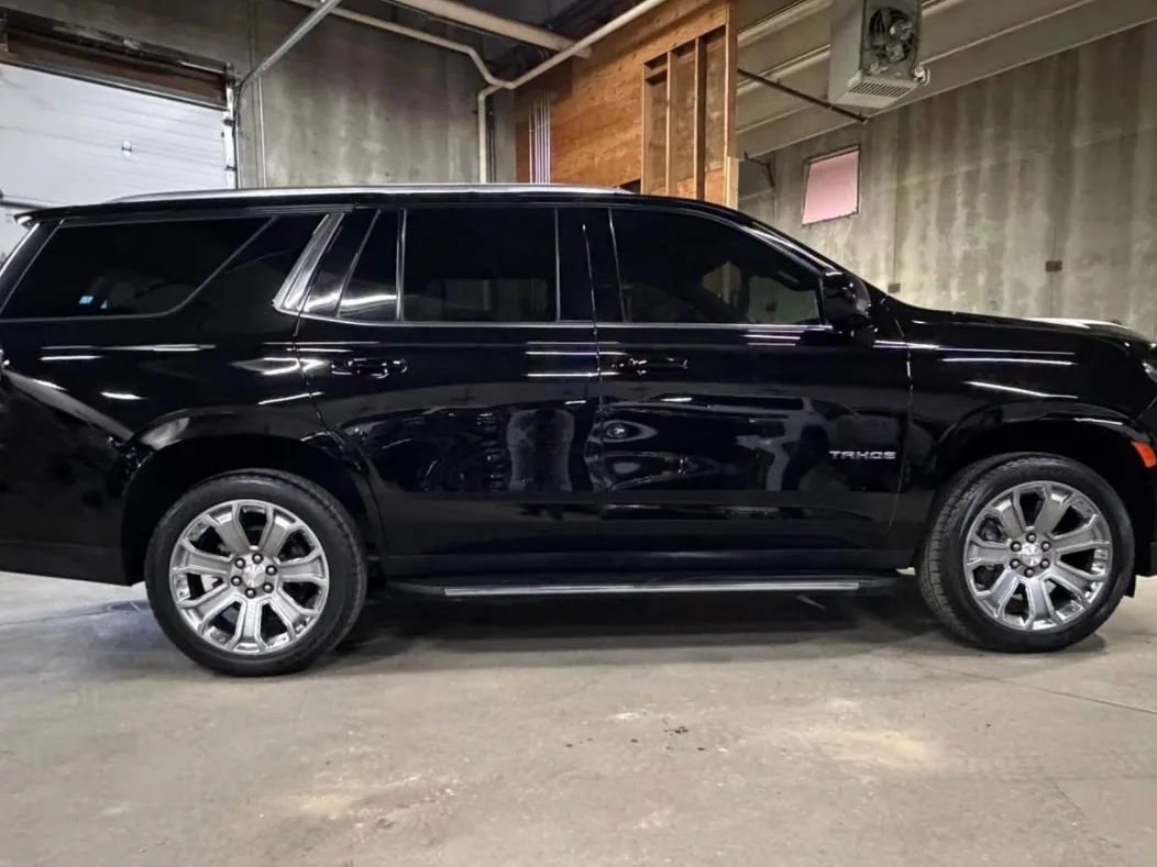 Chevrolet Tahoe with dark window tint by SFR Tint & PDR
